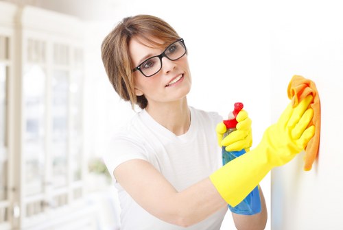 Professional cleaner preparing a property in Edgware