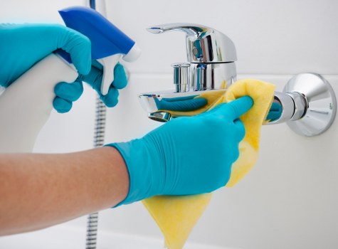 Local sofa cleaning technician treating upholstery in Edgware