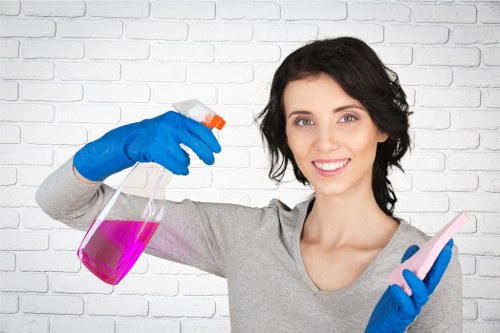Office cleaner maintaining desks, floors, and communal areas in Edgware