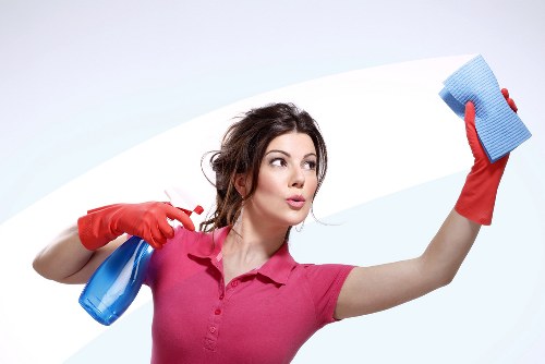 Professional domestic cleaner working in an Edgware kitchen